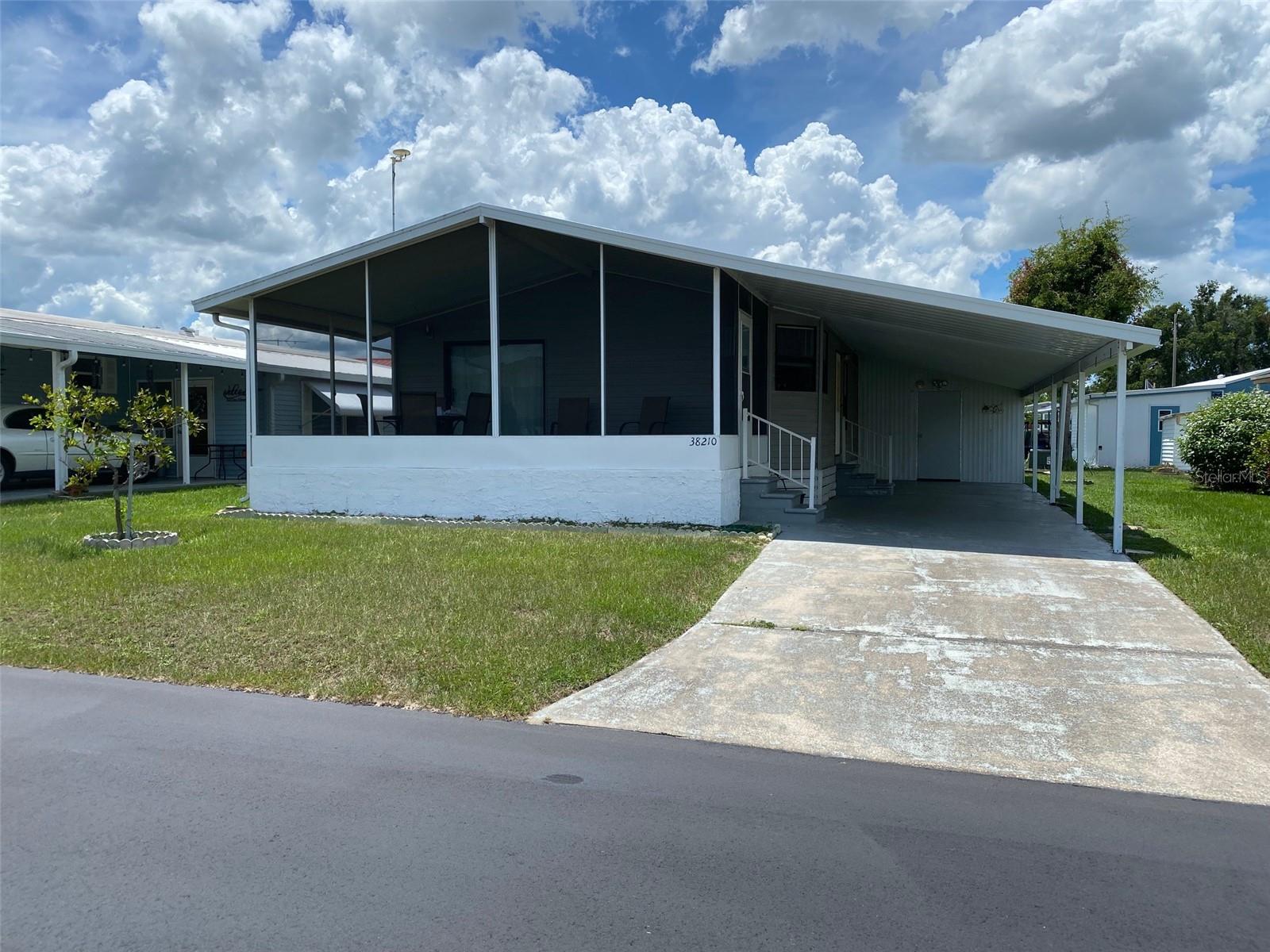 ***MORE PHOTOS ARE ON THE WAY***
This home is a perfect place to call home. Whether you are looking to downsize or you would like a little slice of "The Dream", you should come and see this home. Located in Dade City, Country Aire Estates is close to everything you would need. The historic downtown area is only minutes away from the community. This is a 55+ community, so please be aware of that. The low monthly fee includes water, sewer, trash. In addition, it covers the reserve funding (because no one wants a special assessment), and the upkeep of the common areas. The home is being offered furnished. This property does come with a share in the cooperative.
