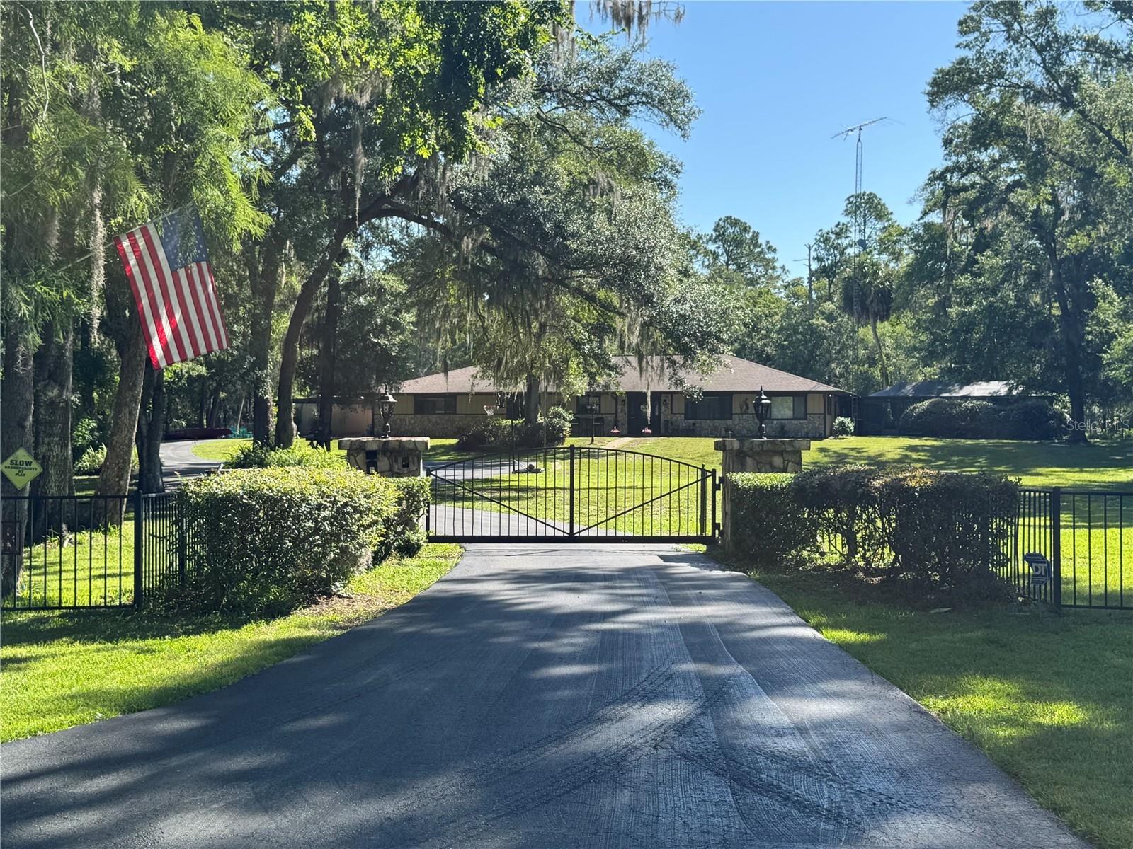 Escape to the Withlacoochee Riverhouse – Your Private Riverfront Retreat in Crystal River, FL! Discover the perfect blend of privacy, comfort, and adventure on this 1.5-acre gated oasis with 270 feet of pristine Withlacoochee River frontage. Nestled in the heart of Crystal River, this stunning property offers the ideal setting for fishing, boating, wildlife watching, or simply unwinding poolside. 3,300 sq ft home with space to sleep up to 15 guests comfortably for Airbnb 3 bedrooms, 2 full baths, plus a bonus Bunk/Game Room and a river-view Sunroom Private heated, screen-enclosed pool Private dock—perfect for kayaking, canoeing, or river cruising Boathouse with screened upper room overlooking the water—ideal for spotting manatees, otters, or deer Deep-water access to the Gulf for scalloping & saltwater fishing Just minutes from Lake Rousseau for freshwater anglers Evenings are magical here—roast s’mores by the outdoor fire pit or sip cocktails on the dock while the sun sets over the water. Inside, enjoy a spacious great room with a stone fireplace, a fully equipped kitchen with breakfast nook and coffee/cocktail bar, plus 60 feet of panoramic river views from the tranquil Sunroom. Fully fenced property with electric gate & paved driveway Washer/Dryer, Air Conditioning, Modern Appliances Ideal for a full-time residence, vacation rental, or multi-family retreat Whether you're seeking peace or play, the Withlacoochee Riverhouse offers a lifestyle like no other. Bring your fishing poles, your paddleboards, and your dreams.