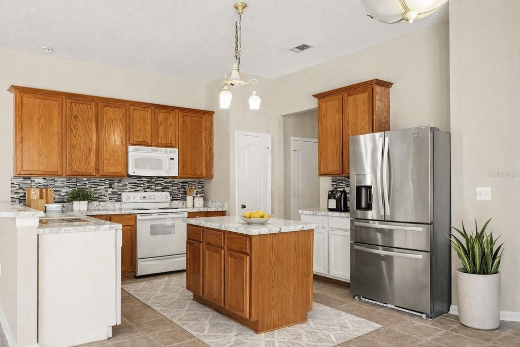 Photo of 26000 Risen Star Drive, Wesley Chapel, FL 33544 (MLS # TB8475806)