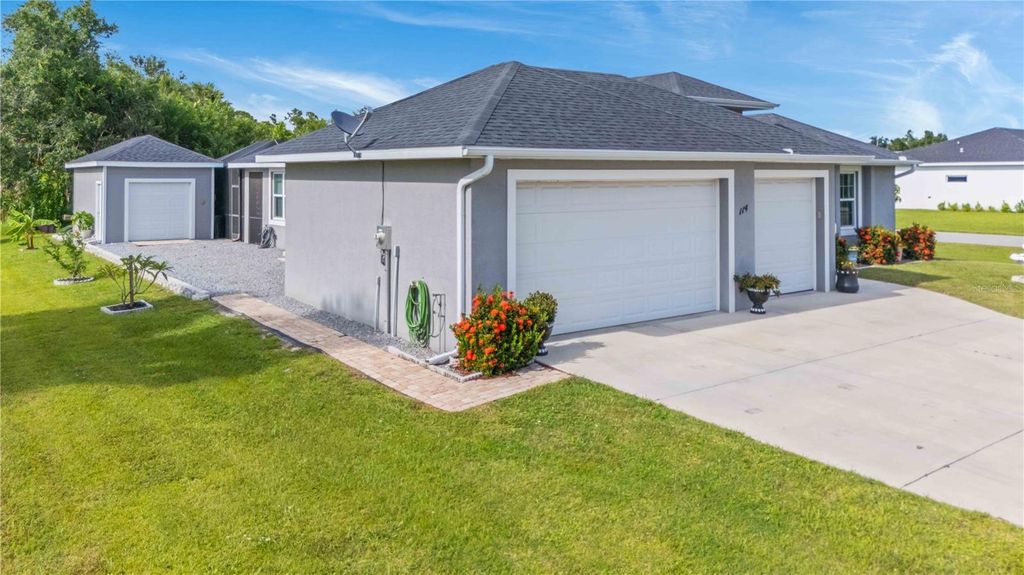Photo of 114 Venice Road, Rotonda West, FL 33947 (MLS # C7513123)