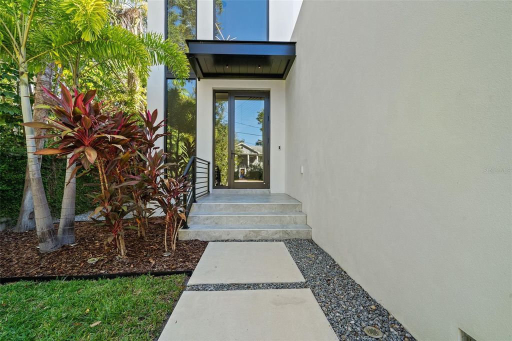 Photo of 5008 S Elberon Street, Tampa, FL 33611 (MLS # TB8439808)