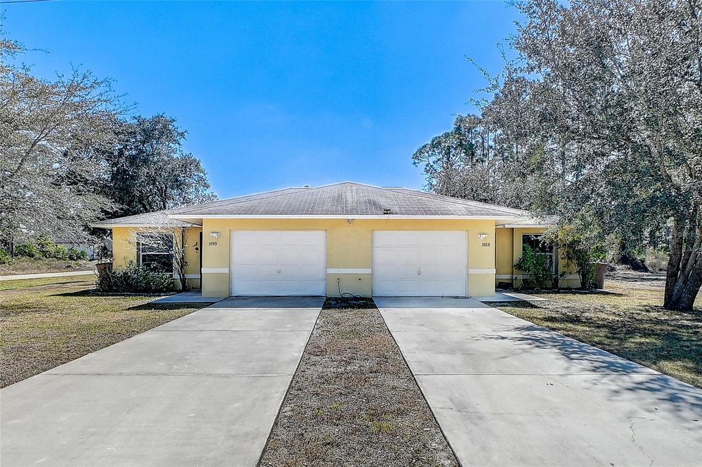 Photo of 1090 Jaguar Boulevard, Lehigh Acres, FL 33974 (MLS # C7521733)