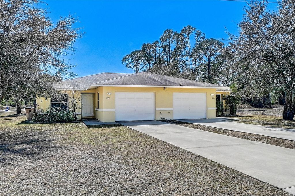 Photo of 1090 Jaguar Boulevard, Lehigh Acres, FL 33974 (MLS # C7521733)