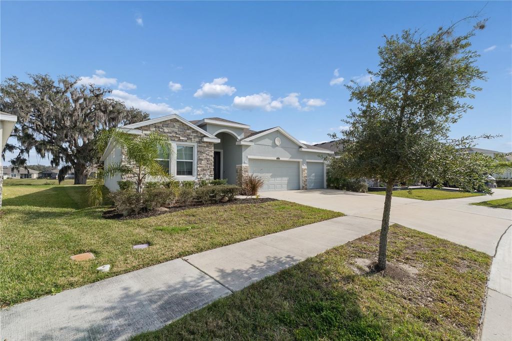 Photo of 10702 Laxer Cay Loop, San Antonio, FL 33576 (MLS # TB8461156)
