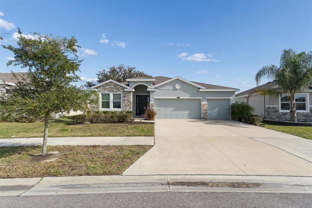 Photo of 10702 Laxer Cay Loop, San Antonio, FL 33576 (MLS # TB8461156)