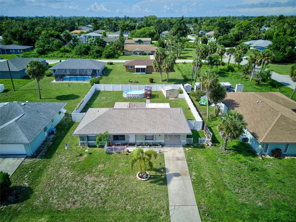 Photo of 1253 Fleetwood Drive NW, Port Charlotte, FL 33948 (MLS # N6144938)