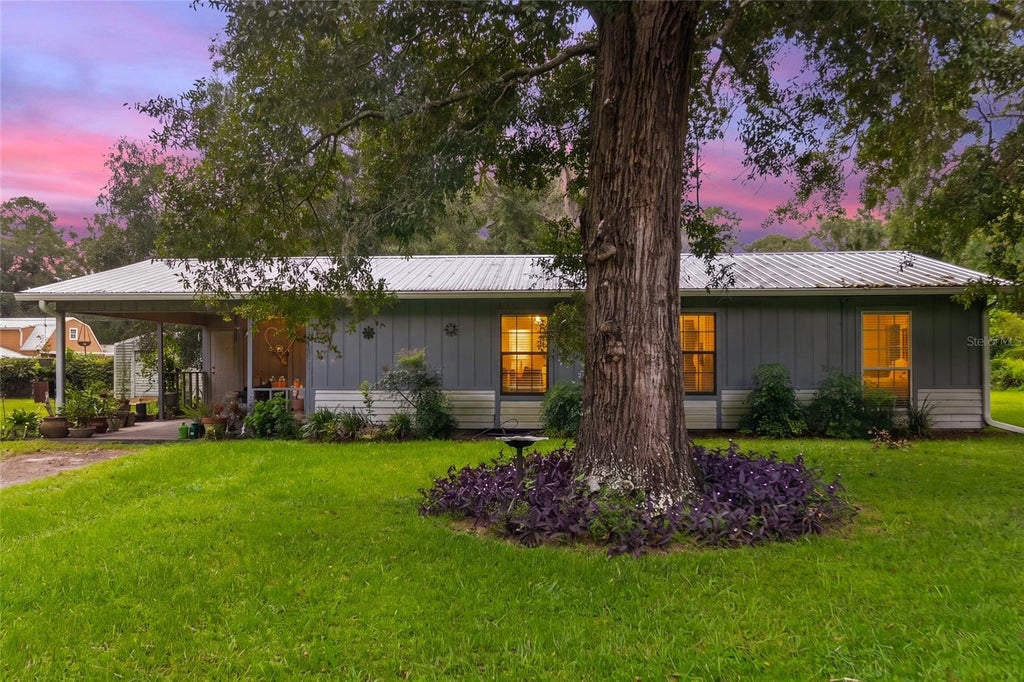 Photo of 188 SW Coliseum Place, Lake City, FL 32025 (MLS # OM732587)