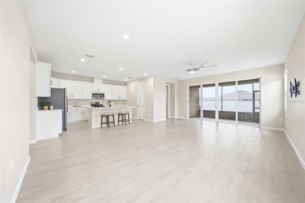 Photo of 253 Hilltop Bloom Loop, Haines City, FL 33844 (MLS # O6397797)