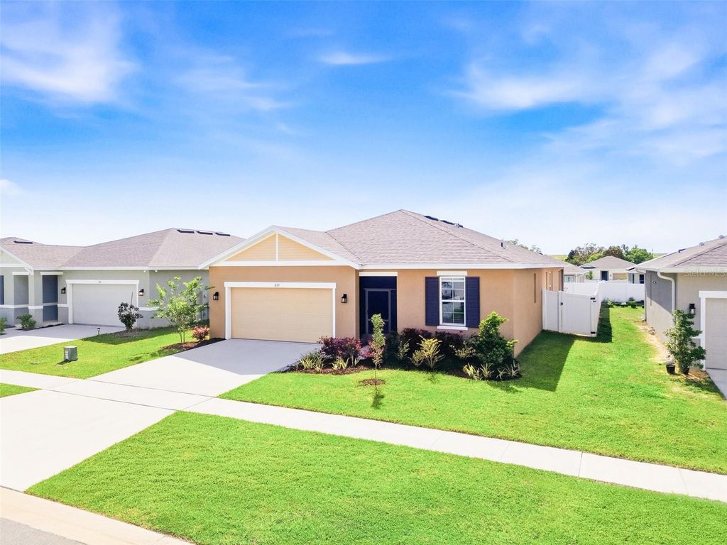 Photo of 253 Hilltop Bloom Loop, Haines City, FL 33844 (MLS # O6397797)
