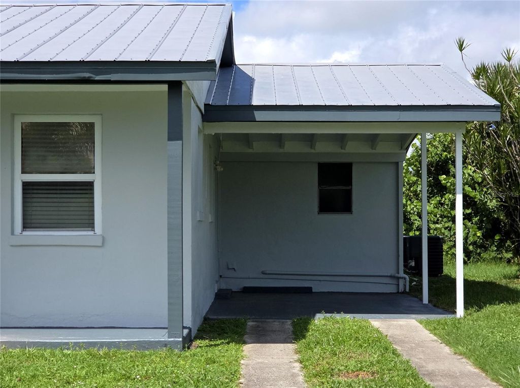 Photo of 154 Salem Avenue NW, Port Charlotte, FL 33952 (MLS # C7514599)