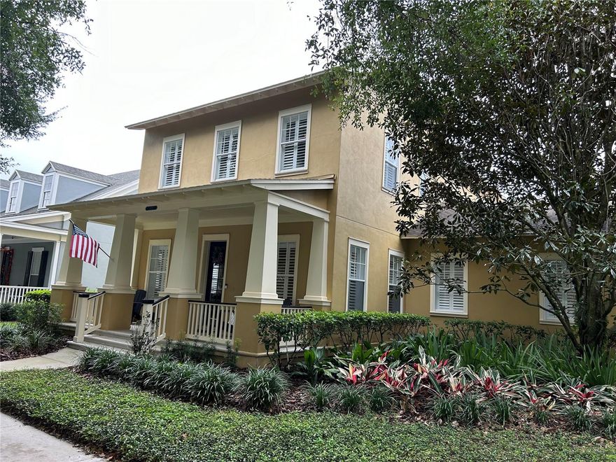 Immaculate Home! Drive up to your new beautifully landscaped craftsman style home in Celebration. Inviting front porch large enough for several rocking chairs to enjoy your evening beverage in style. 
As you enter, beautifully kept brazilian cherry hardwood flooring, dining and formal living, crown molding and wainscoting. Ceilings are adorned with additional architectural accents. This 4 bedroom 2.5 bath home featuring the master suite downstairs with all additional bedrooms upstairs. You will love your large Master bedroom with custom shelving in the large walk-in closet.
As you enter the great room it opens up to you with volume ceilings and lots of light. Kitchen is adjoining with extra tall cabinets, no problem with storage here, great pantry with fold out shelving for extra storage.Wine cooling refrigerator, stove , dishwasher large Refrigerator, and custom barstools included. All rooms have custom Plantation shutters. Eat in breakfast nook. Just down the hall you will see a small office with build in furniture, ready to go! Large laundry room with Washer & Dryer included! 2 Car garage with 2 additional parking spaces in driveway. Back yard features a MICKEY SHAPED POOL! with hot tub, can life get any better?