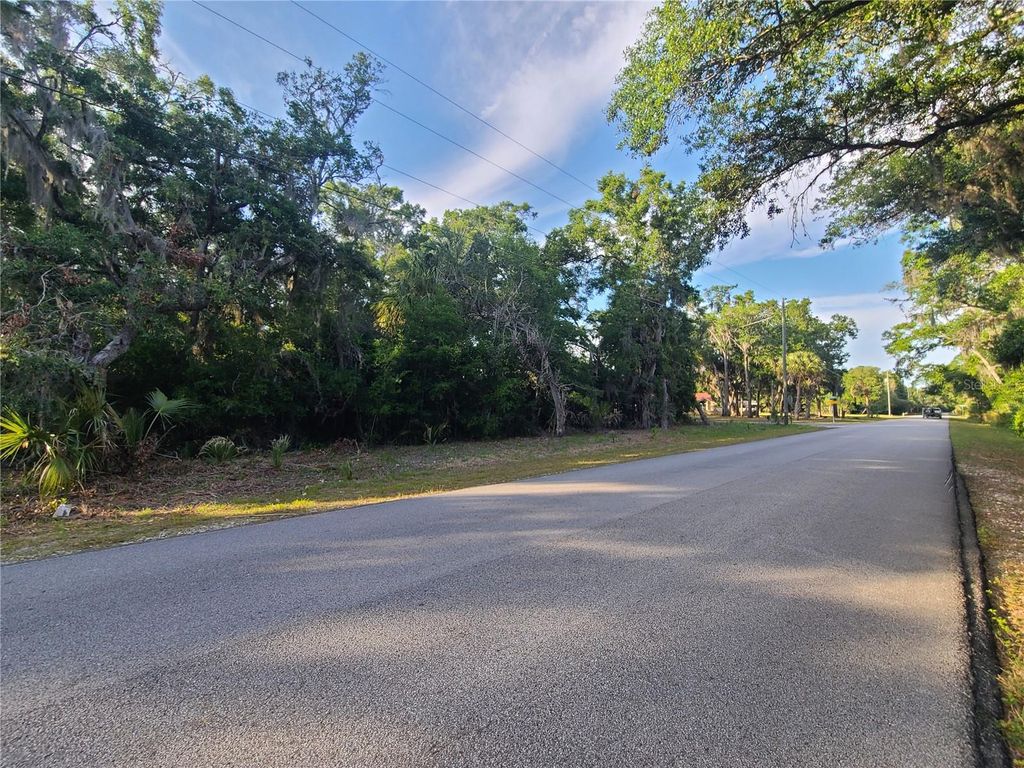 Photo of 9840 N Snowball Point, Crystal River, FL 34428 (MLS # OM677489)