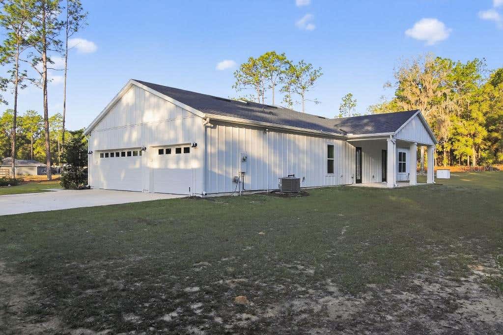Photo of 5859 SW 129th Terrace Road, Ocala, FL 34481 (MLS # TB8530724)
