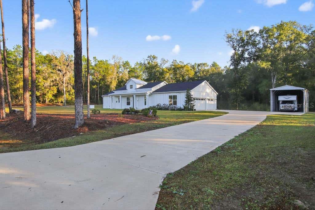 Photo of 5859 SW 129th Terrace Road, Ocala, FL 34481 (MLS # TB8530724)