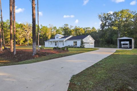 Photo of 5859 SW 129th Terrace Road, Ocala, FL 34481 (MLS # TB8530724)