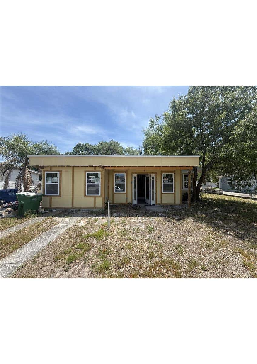 Photo of 4730 W Wallace Avenue, Tampa, FL 33611 (MLS # A4702435)