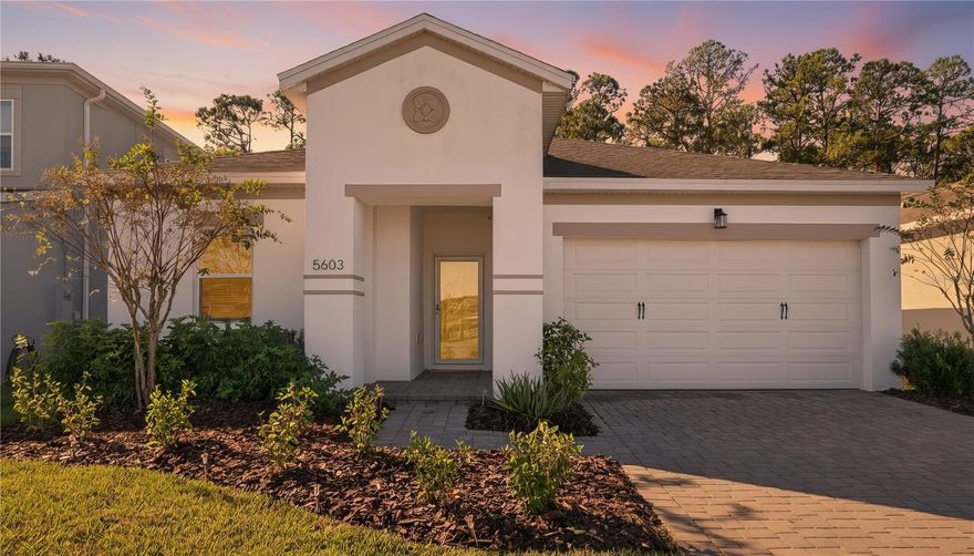 Welcome to this bright and beautifully appointed 3-bedroom, 2-bath home in the heart of Westport Reserve in Port Orange! Just 10 miles from the beach and minutes from the shops and restaurants at the Pavilion, this home offers the perfect blend of peace and convenience with coastal living and everything you need close by. Set in a welcoming community, you'll enjoy access to a resort-style pool, winding nature trails, and even a Little Free Library, creating a relaxed and neighborly atmosphere. Built by Jones Homes USA, the Canaveral floor plan combines space and style with tall ceilings, classic colonial-style trim, and thoughtful custom upgrades throughout. The kitchen is both functional and elegant, featuring granite countertops, 42-inch wood cabinetry, a chic tile backsplash, breakfast bar, and a reverse osmosis water filtration system. The primary suite is a private haven designed for comfort and style, featuring tray ceilings, plush new carpet, and ample space for a sitting area or reading nook. The en suite bath includes a stunning custom stone tile shower enclosure, dual vanities, and a spacious walk-in closet. The secondary bedrooms are generously sized with plenty of natural light and brand-new carpet, ideal for family, guests, or a home office. Step outside to the covered patio, where you can relax and take in tranquil conservation views with your morning coffee or relax and unwind after a day at the beach.Whether you're seeking a stylish forever home or a refined seasonal escape, this elegant Westport Reserve residence offers a lifestyle of comfort, community, and effortless coastal charm.