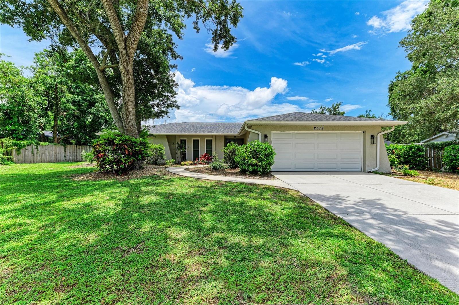Peace and tranquility await in this beautifully updated 3-bedroom, 2-bath home, nestled on a quiet cul-de-sac just 10 minutes from Siesta Key Beach and 15 minutes from downtown Sarasota. Step inside to find a renovated kitchen, new AC and water heater, brand new flooring in the living and dining rooms, and a freshly updated bathroom shower. The split floor plan offers large bedrooms and privacy, while the spacious screened lanai and generous yard provide the perfect setting for outdoor living—with plenty of space to add a pool. With no HOA, there’s room for your boat, RV, or other toys. Conveniently located near schools, shopping, and dining, this move-in ready home is truly a rare find!