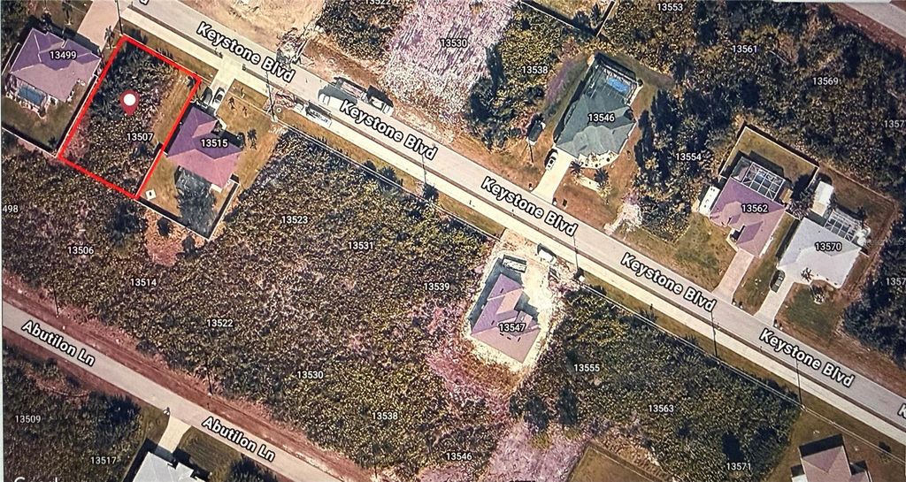 Photo of 13507 Keystone Boulevard, Port Charlotte, FL 33981 (MLS # O6390859)