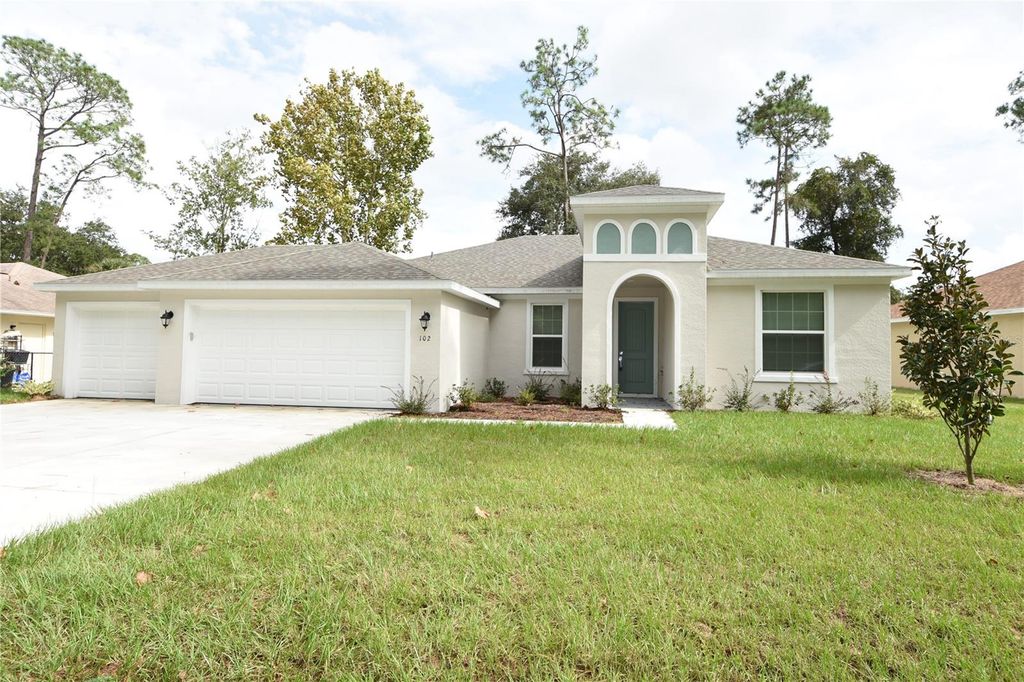 Photo of 102 Brittany Lane, Palm Coast, FL 32137 (MLS # FC317891)