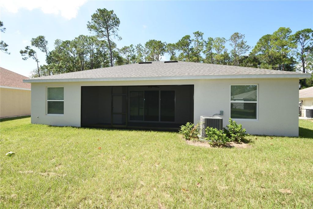Photo of 102 Brittany Lane, Palm Coast, FL 32137 (MLS # FC317891)