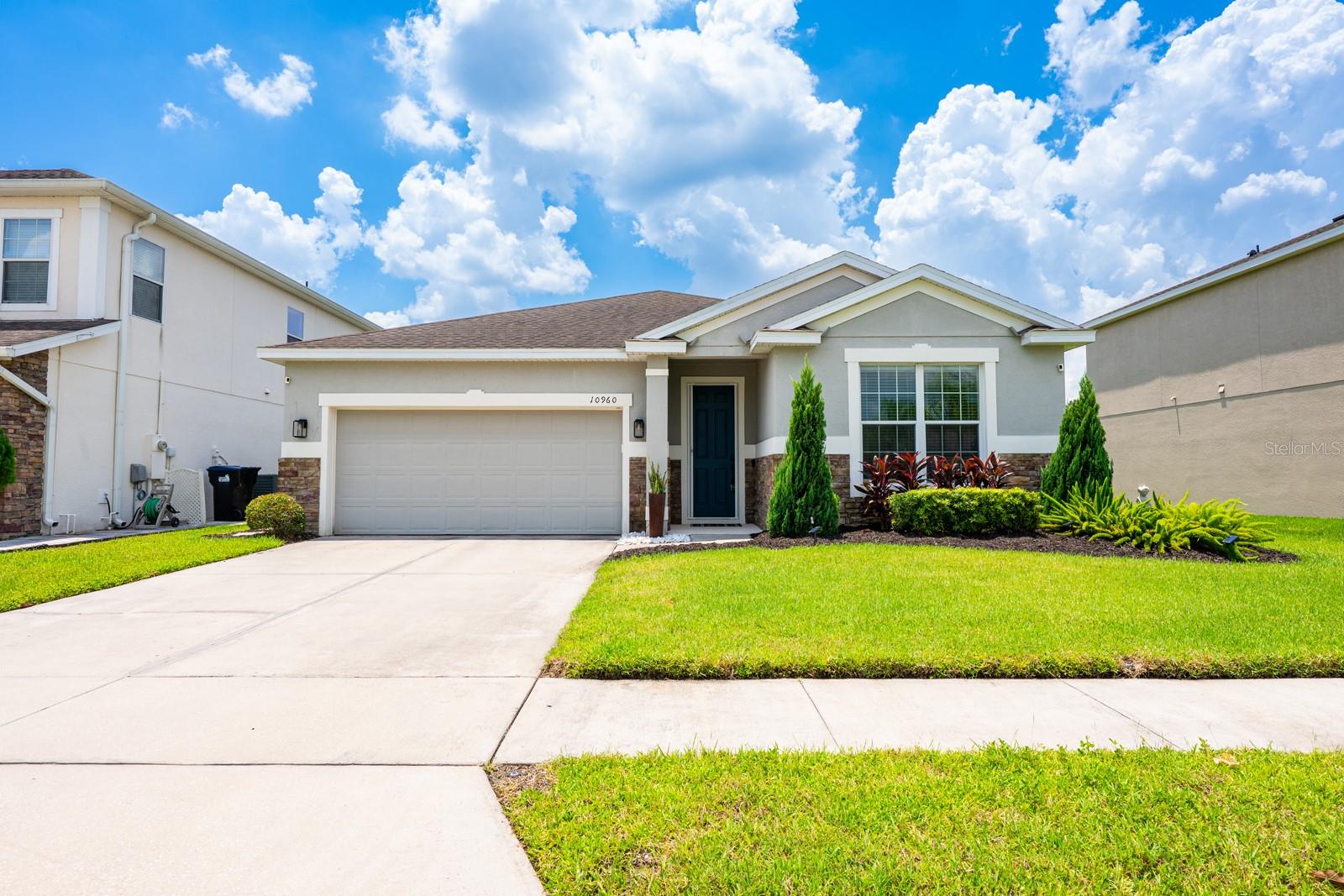 One or more photo(s) has been virtually staged. **Seller may consider buyer concessions if made in an offer**This property qualifies for a credit up to $7275 through the seller's preferred lender**Welcome to this beautifully maintained, SINGLE-OWNER home in Orlando’s sought-after Countrywalk community! Built just 9 years ago, this 3-bedroom, 2-bathroom home has been METICULOUSLY CARED for and feels LIKE NEW. Inside, the OPEN FLOOR PLAN seamlessly connects the Living, Dining, and Kitchen areas, creating the perfect space for entertaining or everyday living. The Kitchen is a SHOWSTOPPER, featuring modern appliances, a sleek tile backsplash, a breakfast bar, and plenty of storage. The SPLIT BEDROOM LAYOUT provides privacy, with the spacious primary suite offering DUAL WALK-IN CLOSETS and a luxurious EN SUITE BATH complete with a garden tub, walk-in shower, and private water closet. Two additional bedrooms are within close proximity to a separate full bath, making this home ideal for family or guests. Step outside to your own PRIVATE RETREAT—a covered patio opens to a RESORT-STYLE, SOLAR-HEATED POOL with a peaceful waterfall feature, enclosed in a screened lanai. The backyard overlooks a PEACEFUL POND and conservation area, ensuring NO REAR NEIGHBORS and an unbeatable sense of privacy. The home also features a (negotiable) 4-CAMERA SECURITY SYSTEM and Ring doorbell camera for added peace of mind. Countrywalk residents enjoy LOW HOA fees and access to a community playground and open green spaces. This convenient East Orlando location puts you just minutes from WATERFORD LAKES TOWN CENTER, Valencia College East Campus, UCF, and an array of shopping and dining options along Curry Ford Road and SR 50. QUICK ACCESS to SR 417, SR 408, and the 528 makes commuting to DOWNTOWN ORLANDO, AREA THEME PARKS, and ORLANDO INTERNATIONAL AIRPORT a breeze. Nearby outdoor destinations include Blanchard Park, Downey Park, and neighborhood trails and recreation facilities. Discover your PERFECT FLORIDA OASIS complete with a sparkling pool and peaceful pond view—don’t wait, schedule your private showing TODAY!