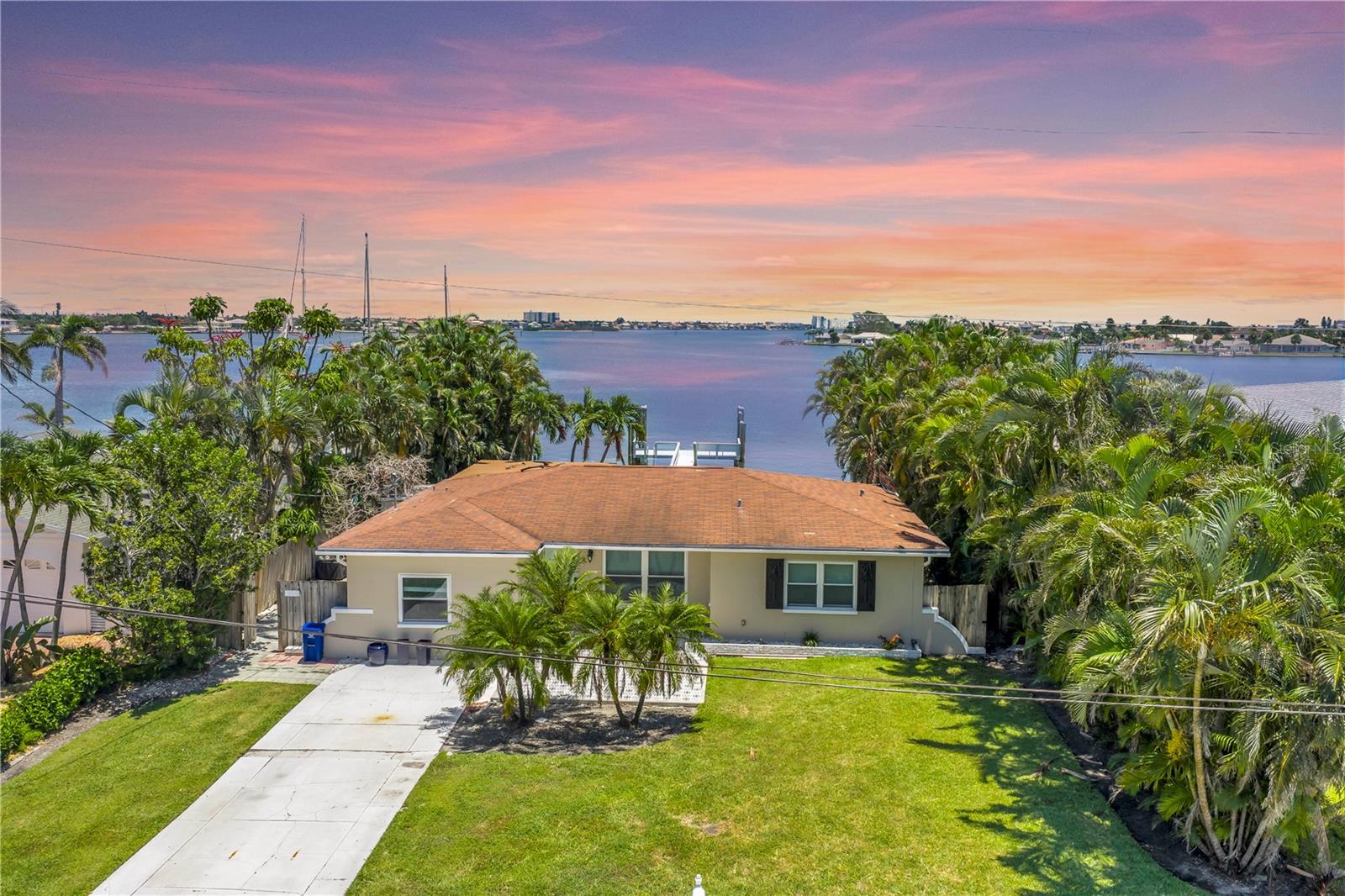 Private Backyard & WOW Waterfront Paradise with Endless Potential in St. Pete Beach
Enjoy the rare combination of a private backyard and stunning waterfront views—all in the heart of St. Pete Beach! Wake up to breathtaking panoramic views of Boca Ciega Bay—stretching all the way to downtown St. Pete. This deep-water property is a dream for boaters, water lovers, and visionary buyers. Whether you’re looking to restore the current home to its full glory or start fresh with a custom build, this is the perfect canvas.
Situated on a generous 75’ of private waterfront with a seawall and dock, this home offers direct access for boating, fishing, and dolphin watching right from your own secluded backyard. Enjoy your morning coffee with pelicans overhead, take a sunset cruise, or stroll just 3 blocks to Corey Avenue for shopping, dining, entertainment, and the popular Sunday Morning Market.
The property sits on a spacious 75x140 (10,502 sqft) lot in the heart of St. Pete Beach, steps from the Gulf. The existing 1,704 sq. ft. home includes 3 bedrooms and 2 baths. The backyard is surrounded by mature landscaping, offering exceptional privacy for relaxation or entertaining. The home did take on water during Hurricane Helene, but FEMA has designated it non-substantial damage, meaning you can either remodel the existing structure or build new.
This location offers the best of Florida living—just off Gulf Blvd, minutes to sandy beaches, vibrant restaurants, beach bars, live music, and world-class sunsets.
Highlights:
Private backyard with mature landscaping for exceptional privacy
75' deep-water frontage with dock & seawall
Prime location on Boca Ciega Bay with downtown St. Pete views
Large 10,502 sqft lot (75x140)
Non-substantial FEMA designation—remodel or rebuild
Walk to Corey Avenue, restaurants, shopping, and beaches
Enjoy the Sunday Morning Market on Corey Ave, only 3 blocks away
Priced at land value, sold AS-IS. Whether you’re a builder, investor, or dreamer, this is your chance to create your ultimate coastal retreat in one of the most sought-after areas of St. Pete Beach. Paradise awaits!