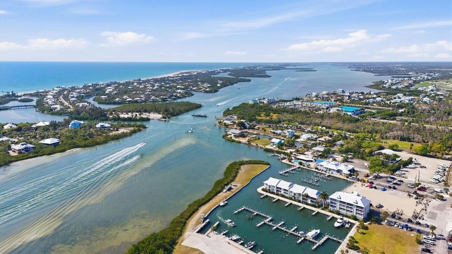 Perfectly positioned to capture breathtaking marina and Intracoastal views, this 1-bedroom, 1-bath condo offers effortless coastal living. Step inside to find a thoughtfully designed entryway featuring stunning Meg Braff wallpaper, setting the tone for a stylish interior inspired by the timeless charm of the Gasparilla Inn. Beautiful plank tile flooring flows throughout the main living area, complemented by custom cabinetry and fresh new interior paint, creating a clean and elevated coastal aesthetic. Ideally situated within the community, this condo is just a short distance from the pool and spa, offering added convenience for relaxation and leisure. As a resident of Harbortown Village, you’ll be part of the Palm Island Resort program, bringing resort-style living right to your doorstep. Enjoy exclusive access to private beaches, a state-of-the-art fitness center, tennis courts, the renowned Rum Bay Restaurant, and complimentary water taxi transportation, making every day feel like a vacation.
 Ideally located in the Placida corridor, you’re just minutes from Boca Grande, known for its exceptional dining, boutique shopping, world-class fishing, and premier golf courses. Boating enthusiasts will love the availability of deep-water slips and marina storage, offering effortless access to open waters. Whether you’re looking for a personal getaway or an investment opportunity, this condo perfectly blends luxury, convenience, and coastal charm. Don’t miss your chance to own a piece of paradise, schedule your private showing today!