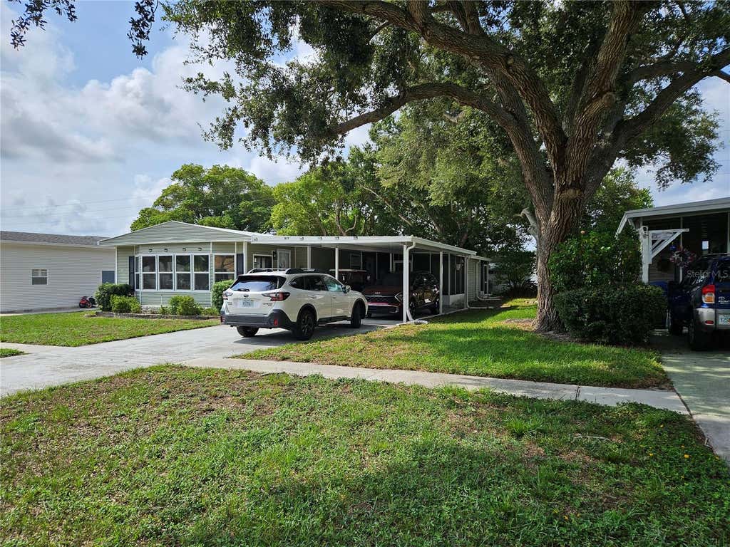 Photo of 217 Lake Tarpon Drive #24, Palm Harbor, FL 34684 (MLS # TB8533541)