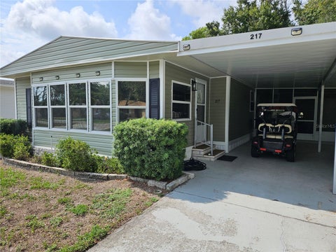 Photo of 217 Lake Tarpon Drive #24, Palm Harbor, FL 34684 (MLS # TB8533541)