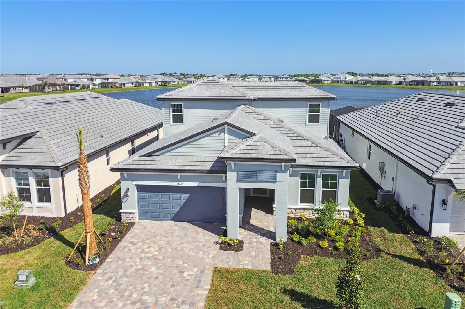 ****SPECIAL FINANCING AVAILABLE FOR A LIMITED TIME ONLY FROM PREFERRED LENDER. RESTRICTIONS APPLY, FOR QUALIFIED BUYERS, SUBJECT TO APPLICABLE TERMS AND CONDITIONS. SUBJECT TO CHANGE WITHOUT NOTICE****
Welcome to the Calusa in Sweetwater. Boasting over 2,900 square-feet, this stunning four-bedroom, four-bathroom home, with den and upstairs bonus room, is now available for sale.
Located in a prime area, this property offers a spacious and modern living experience. Step inside this single-story home and prepare to be impressed by the high-quality craftsmanship and attention to detail. There is plenty of room for you and your loved ones to spread out and enjoy.
The kitchen in this home features ample counter space and a sleek design that will make meal preparation a breeze. Whether you're hosting a dinner party or simply enjoying a cozy breakfast, this kitchen will be a hub of culinary delight.
The bedrooms in this home provide a tranquil retreat for relaxation and rest. Spacious and well-designed, they allow for plenty of room for furniture and personalization. You'll have no trouble making these bedrooms your own and turning them into cozy havens for a good night's sleep.
Each of the four bathrooms in this house exude luxury and comfort. The well-appointed fixtures and stylish finishes add a touch of elegance to the space. With multiple bathrooms, getting ready in the mornings will be a seamless and stress-free experience.
In addition, this property has a two-car garage, providing ample space for parking and storage. You'll have peace of mind knowing your vehicles are protected and secure.
This house is located in a sought-after neighborhood in Lakewood Ranch, Florida. The area is known for its friendly and welcoming community, making it a perfect place to call home. Residents enjoy easy access to local amenities, including shopping, dining, parks, and entertainment options, all within a short distance.
This property combines quality, comfort, and convenience in one remarkable package.
