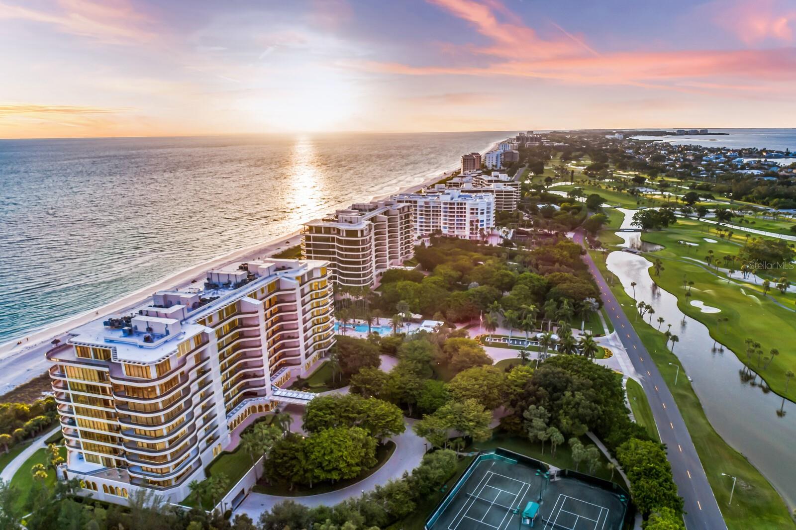 Experience luxury living at its finest with this breathtaking Royal floorplan within L'Ambiance at Longboat Key Club. Boasting a coveted southern exposure and direct beach front access, this rarely available expansive corner residence features wraparound terraces that offer unparalleled vistas of the majestic Gulf of Mexico waters and pristine white sandy beaches. L’Ambiance seamlessly blends casual elegance with upscale amenities. Step off the elevator into your private lobby and delight in the impeccable design details including soaring 10 ft. ceilings, polished marble flooring throughout, and a state-of-the-art gourmet kitchen perfect for culinary enthusiasts. The Gulf-front master suite showcases panoramic views and opens onto the expansive terrace, offering a serene retreat complete with walk in closet and private bath. This remarkable residence has been completely remastered with bespoke finishes. The exceptional and highly sought after Royal floorplan features three true bedrooms, each with its own private ensuite, as well as an additional bonus room, ideal for versatile living spaces. Residents of L'Ambiance enjoy an array of exclusive amenities, including a dedicated concierge in the lobby, 24-hour guard gate security, and a lavish Olympic-size pool overlooking the Gulf, surrounded by lush landscaping. Further enhancing the lifestyle at L'Ambiance are two Har-Tru tennis courts, a state-of-the-art fitness center with his and her locker rooms, game and billiard rooms, a library, wine room, and three private guest suites. Additionally, this residence offers the convenience of two underground parking spaces. Situated just minutes from the renowned shopping and dining destinations of St. Armands Circle, L'Ambiance offers unparalleled luxury living in an unrivaled beachfront setting.