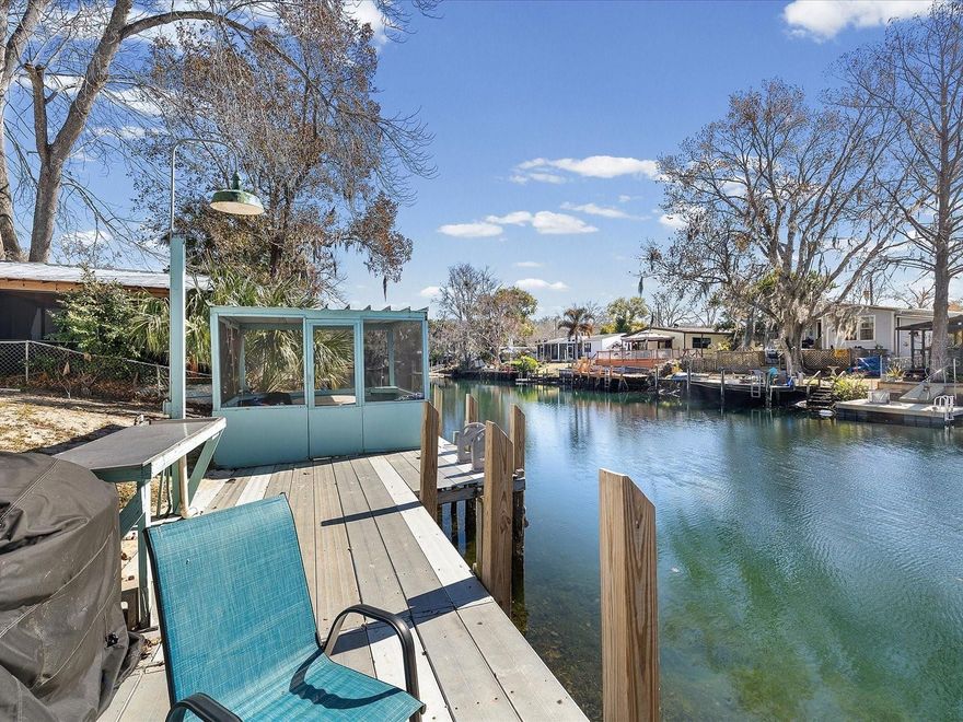 Welcome to your slice of Florida waterfront paradise. This charming 2-bedroom, 2-bath canal-front home offers direct access to the Weeki Wachee River and the open Gulf — delivering the ultimate boating and coastal lifestyle right from your backyard.

Built in 1993 and thoughtfully designed across 840 square feet, the layout maximizes every inch of space, creating a light, functional, and inviting interior. Fresh interior paint and cosmetic updates make the home move-in ready. 



Step outside and the lifestyle truly begins. Launch your kayak at sunrise, spend afternoons paddleboarding the crystal-clear river, cruise to the Gulf for fishing and scalloping, or simply unwind dockside with coastal breezes and peaceful canal views. The screened-in room near the dock is a standout feature — the perfect spot for morning coffee, sunset cocktails, or relaxing bug-free after a day on the water.

Short-term rentals are allowed, and the property has a successful history as a vacation rental. The current owners enjoy it personally and generate income when not in residence — offering a rare combination of flexibility and investment potential.

Located just minutes from local waterfront restaurants, marinas, and coastal attractions, this home is ideal as a primary residence, weekend escape, or income-producing waterfront retreat.

Direct Gulf access. Proven rental potential. Effortless Florida living.