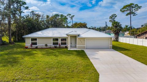 Photo of 3046 Woodland Drive, Edgewater, FL 32141 (MLS # V4944351)