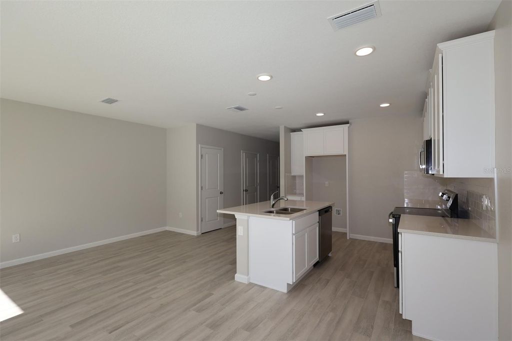 Photo of 4128 Campsite Loop, Orlando, FL 32824 (MLS # O6389898)