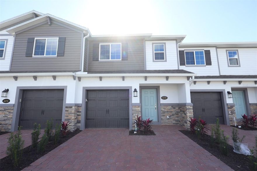 Discover this exceptional new construction townhome at 4128 Campsite Loop in Orlando, offering 1,569 square feet of thoughtfully designed living space.

This well-appointed townhome features 3 bedrooms, 2 full bathrooms and a powder room, a loft, a lanai, and 1-car garage.

The thoughtfully planned floorplan maximizes every square foot, creating an inviting atmosphere perfect for daily living and entertaining. The open-concept design allows natural light to flow freely throughout the main level, enhancing the sense of space and connectivity.

The owner's bedroom provides a private retreat with its en-suite bathroom and walk-in closet, while the additional bedrooms offer flexibility for family, guests, or home office space.

As a new construction home by M/I Homes, you'll enjoy the benefits of contemporary building standards, energy efficiency, and the peace of mind that comes with a newly built home.

Contact us today to learn more!