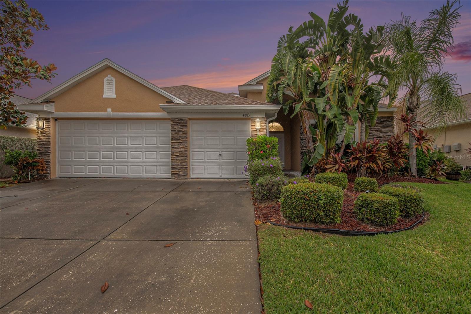 Beautiful home in the heart of Palm Harbor, FL. This home has an open-concept floor plan that offers both style and functionality. With Solar Panels, you get to take advantage of MUCH LOWER electric bills!! The spacious living area offers an inviting and warm atmosphere which is also great for gatherings. The kitchen is equipped with stainless appliances, double oven, breakfast bar, plenty of cabinet space, and a closet pantry. The owner's suite features a generous double walk-in closet and an en-suite bathroom featuring a spa-like soaking tub, dual vanities, and separate shower. The remaining three bedrooms are generously sized. One of the unique features of this home is the versatile loft space. Playroom, reading nook or a home gym, the possibilities are endless! This bonus space adds an extra layer of functionality to an already well-thought-out floor plan. The living area and the primary bedroom open up to the outdoor space, which is equipped with a covered patio, saltwater pool and spa. Lawn and pool service included. Conveniently located in Palm Harbor, this home provides easy access to the area's top-rated schools, shopping districts, and recreational amenities. The beaches and everything the Bay Area has to offer is only a short commute away. Call today for your private viewing!