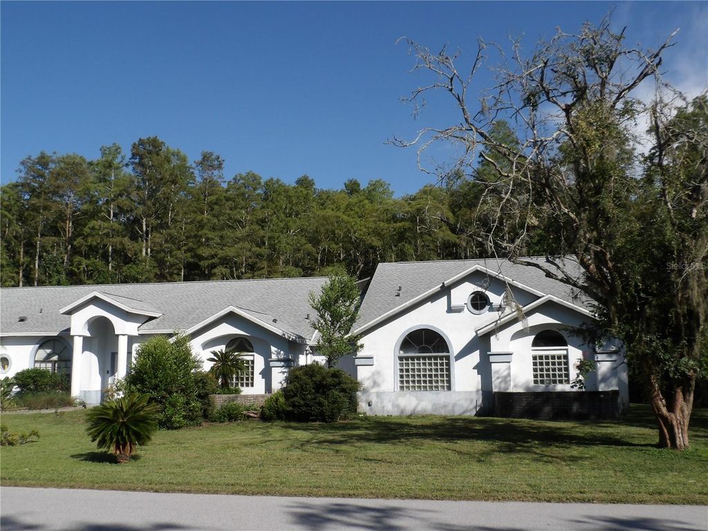 Photo of 7222 Auburn Lane, New Port Richey, FL 34654 (MLS # TB8418382)