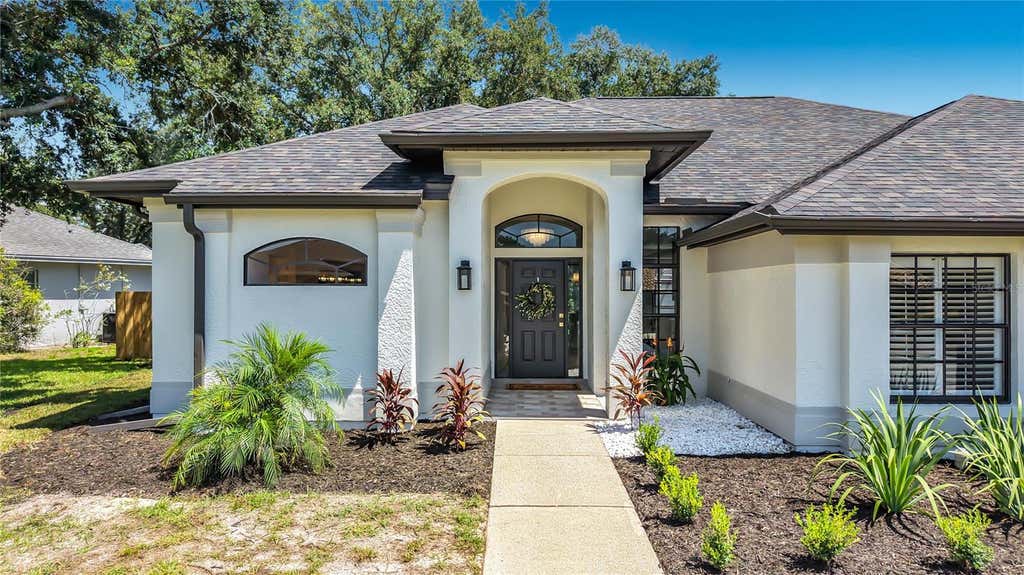 Photo of 927 Whippoorwill Drive, Palm Harbor, FL 34683 (MLS # TB8538866)