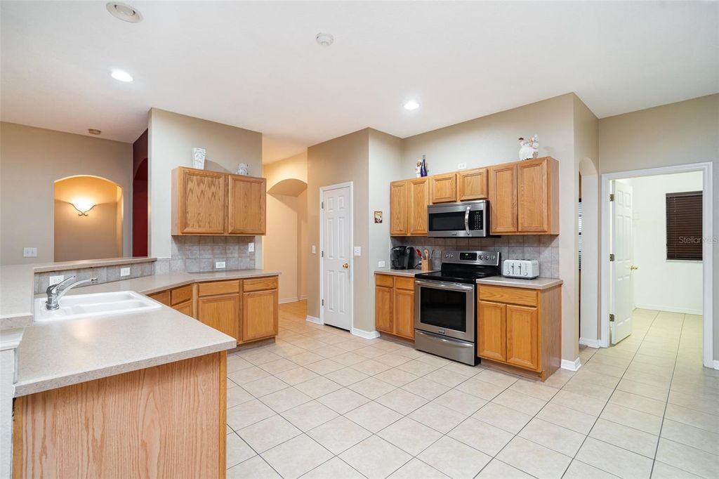 Photo of 10903 Wildcat Drive, Riverview, FL 33579 (MLS # TB8412190)