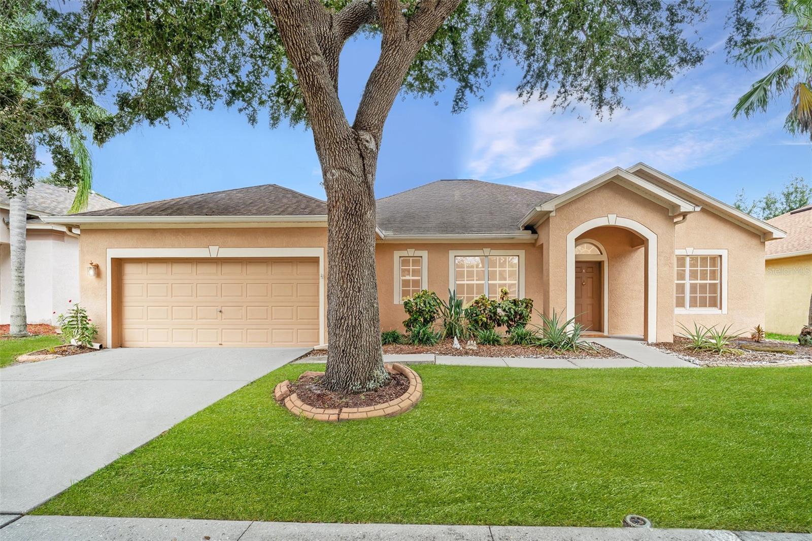 Welcome to this beautifully maintained 3-bedroom, 3-bathroom home located in the highly sought-after Panther Trace community in Riverview. Offering a thoughtful layout and plenty of room to grow, this spacious residence features formal living and dining rooms, plus a comfortable family room — perfect for both entertaining and everyday living. The formal living area can easily be used as a study or home office, providing added flexibility.
The large kitchen is a standout with stainless steel appliances, a contemporary tile backsplash, ample cabinetry, and an eating bar that opens to the family room.
The primary suite includes a generous walk-in closet and a private en suite bathroom with dual sinks, a soaking tub, and a separate shower stall. Each of the additional bedrooms has a bathroom conveniently located nearby, and a central loft area between them offers ideal space for a playroom, reading nook, or media zone.
Additional highlights include: Ceiling fans throughout, Indoor laundry room, sliding glass doors that lead to a screened-in, enclosed porch
Oversized backyard — perfect for outdoor gatherings or creating your own backyard retreat, two-car garage and a brand new roof scheduled for installation in August 2025
Residents of Panther Trace enjoy resort-style amenities including a clubhouse, community pool with gazebo, outdoor volleyball court, playground, basketball, and tennis courts. Conveniently located near I-75 and Highway 301, the home is close to top-rated schools, shopping, dining, and parks. Just a short drive to downtown Tampa, Apollo Beach, and Gardenville Beach, this home combines comfort, convenience, and community.
Don’t miss the opportunity to call this exceptional property your new home—schedule your private showing today!