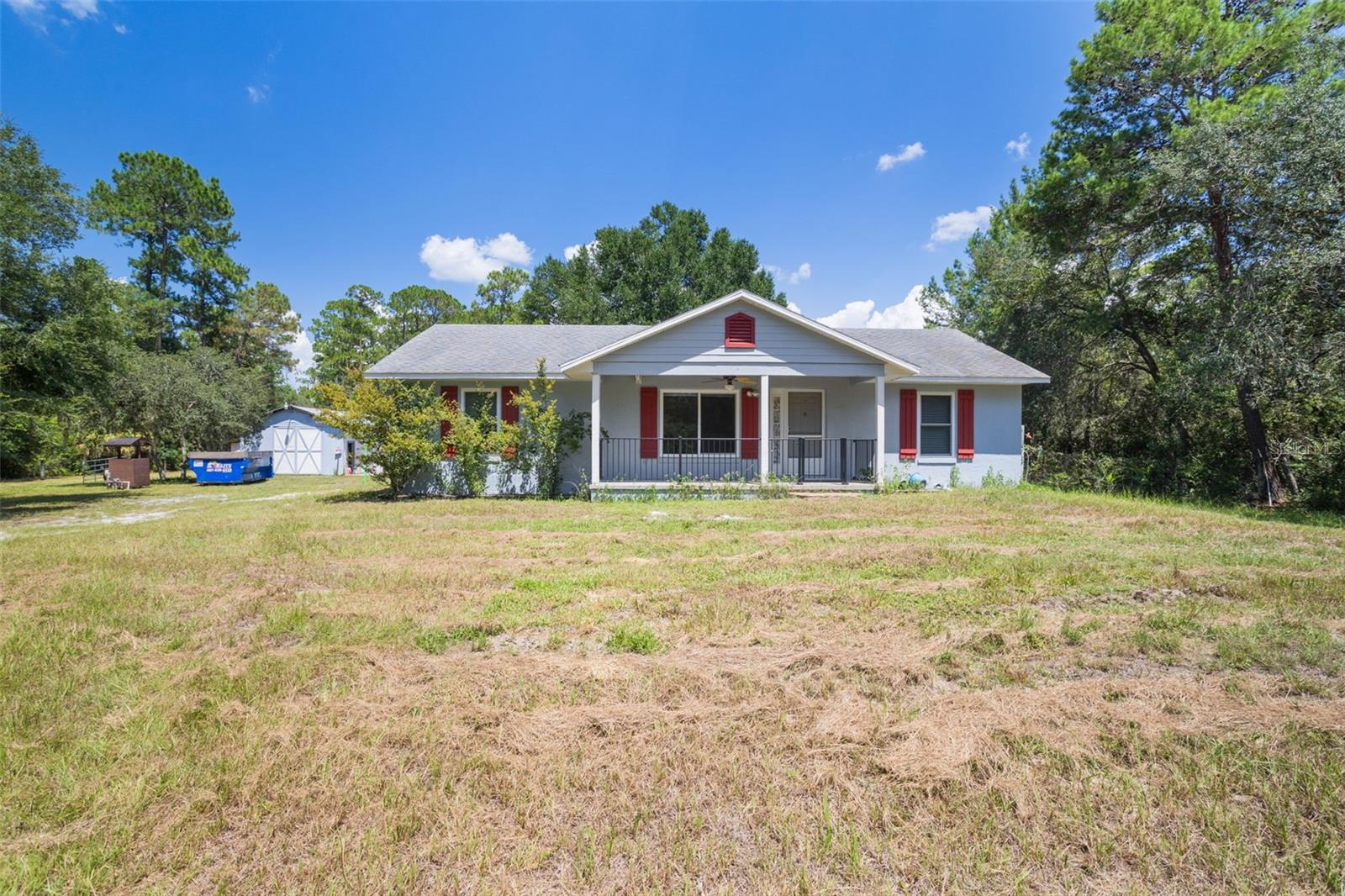 In Paisley over 5 acres of property with this 3 bedroom 2 bathroom home. An oversized detached garage (1181 sq ft) with workshop. There is also an enclosed pole barn to use for your life stock as well. Fenced and some cross-fenced. The home needs some TLC but certainly keep this in mind with all the possibilities of home ownership. No stove or refrigerator. New A/C will be installed soon. Open floor plan with great room, dining room and kitchen. Wood burning fireplace in Great room. Separate living room and split bedrooms. All ceramic tile floors and concrete floor in primary bedroom.