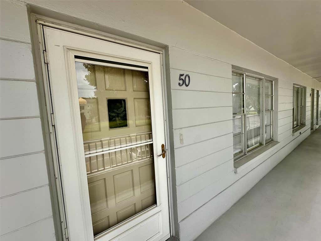 Photo of 2100 World Parkway Boulevard #50, Clearwater, FL 33763 (MLS # TB8535323)