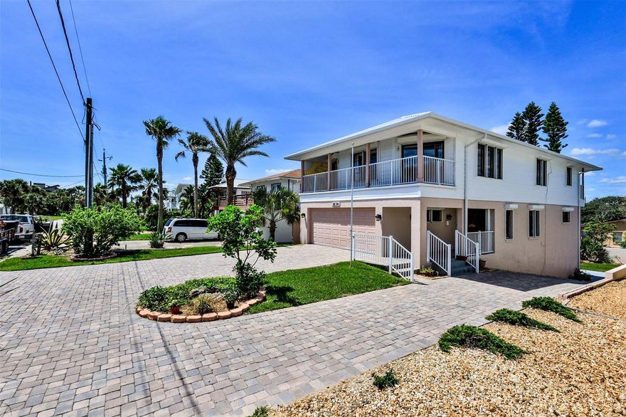 What a lot of house with such great views of the ocean! If you need space, this is the place for you! Over 2,664 ft. of living area, this 5BR/3BA home has a 2 car garage + an additional 2 car garage on the 1st level, which can be a workshop, studio, or even an inlaw suite if needed. Situated across from multi million dollar oceanfront homes and just a few houses from the public beach walk over! The aluminum metal roof was put on just last year, and the attractive pavered parking & driveway is beautiful! Well maintained, this 3 story home is concrete block stucco on the 1st & 2nd level and the 3rd level is frame with hardiboard siding. The spacious balcony on the east side provides great views of the ocean & the 2 balconies on the back offer fabulous sunsets! Special features include hurricane shutters on all windows & doors, which are quality Pella brand windows & doors. Other upgrades include the electric panel which was new 2019 & the SS Refrigerator new 2020. Each floor has its own A/C unit so there are 3 separate units, there are two chairlifts, one from the 1st to the 2nd floor and one from the 2nd to the 3rd floor. Private backyard is surrounded by a CBS wall/fence on all 3 sides. ;Water: City