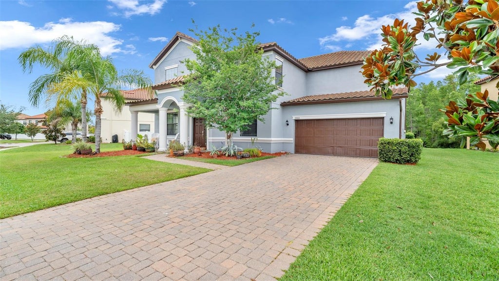 Photo of 19265 Umberland Pl, Land O Lakes, FL 34638 (MLS # TB8556745)