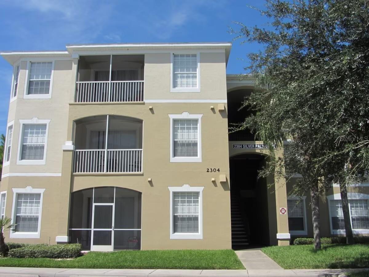 Located just minutes from Walt Disney World in the gated resort community of Windsor Palms, this fully furnished, turnkey 3-bedroom, 2-bath top-floor condo offers comfort, privacy, and strong income potential. No upstairs neighbors, tasteful updates throughout, and a light-filled layout make this a standout opportunity for both personal use and investment. HOA includes the Cable, Internet and water. Not to mention all the amenities in this guard gated community. Lush grounds with mature trees though out.
Sellers recent enhancements include wood-style flooring in the living area, new bedroom carpets, a 2024 refrigerator, and a Keurig coffee system. Spacious primary suite features a king bed and walk-in closet; two guest bedrooms include queen and twin setups, plus a bonus memory foam foldout and crib. 4 flat-screen TVs.
Rental projections range from $28K–$35K+ annually, with nightly rates from $115–$200+ depending on season and occupancy.
Windsor Palms is packed with resort-style amenities that make it a standout for both vacationers and investors. Here’s what guests and owners can enjoy:
• Heated resort-style swimming pool with a zero-entry feature, plus a relaxing hot tub and a splash pad for kids
• 7,500 sq ft clubhouse with a lounge, fitness center, and sundry shop
• 58-seat private movie theater—perfect for rainy days or family nights
• Arcade and game room with ping pong, billiards, and video games
• Tennis, basketball, and sand volleyball courts, all lighted for evening play
• Children’s playground and BBQ picnic area for outdoor fun
• Free clubhouse Wi-Fi and a business center for remote work or planning park days
• Tiki bar for poolside snacks and drinks
,High-speed WiFi