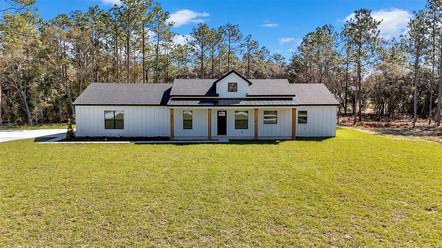 NO HOA—So You Save Money!  This beautifully updated 3-bedroom, 2-bath home in Rolling Hills sits on just over an acre and is perfect for the buyer looking for that farmhouse country style living. Step inside to find durable, easy-to-clean tile flooring (no carpet!) and a bright light kitchen that’s Pinterest-ready and perfect for hosting. Natural light pours in throughout the home, making every room feel warm and welcoming.    Whether you’re cooking for family or entertaining guests, this open layout makes it easy to gather and connect. Stainless steel appliances and farmhouse sink with quartz countertops makes this kitchen a dream.     The primary bedroom is spacious with plenty of natural light. The primary bathroom is like a spa with double head shower, upgraded tile, and free standing large oval tub. The layout of this home was thoughtfully designed and every space is useable.     Outside, there’s plenty of space to garden, roam, or add a pool—whatever fits your lifestyle.    Located just minutes from Florida’s world-famous freshwater springs and endless outdoor activities. This home is also 10 minutes from the world equestrian center and five star restaurants.  This home truly offers the peace of country living with all the convenience you need. No HOA, low maintenance, and tons of space to make it your own—this is the one you’ve been waiting for!