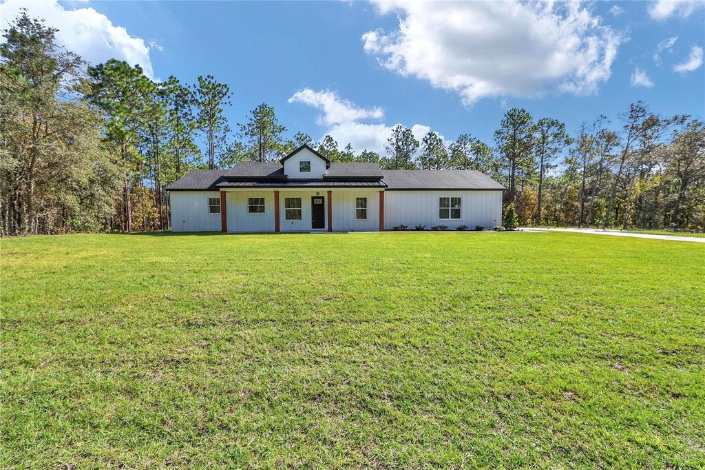 Photo of 7525 SW 136 Terrace, Dunnellon, FL 34432 (MLS # O6349059)
