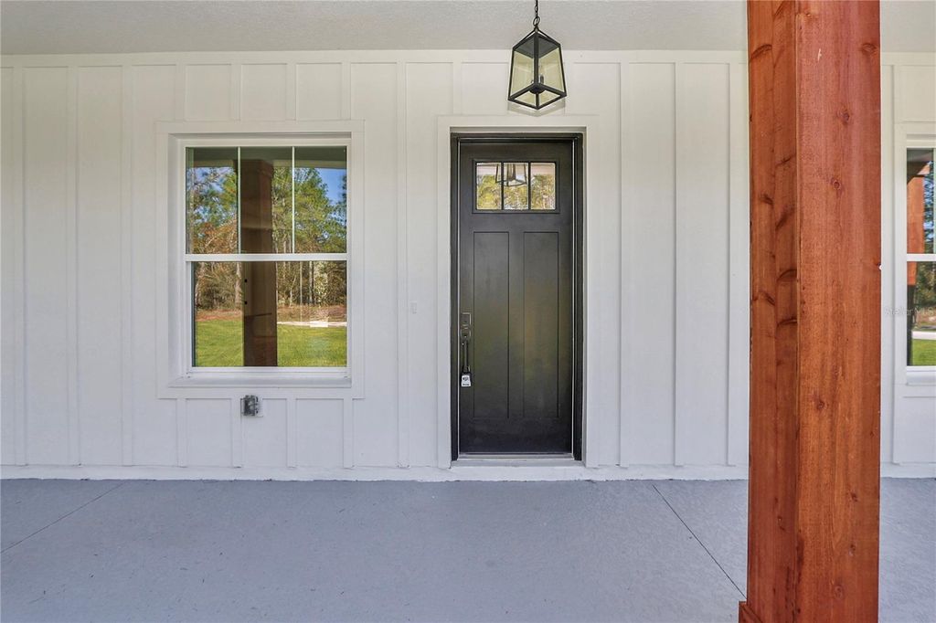 Photo of 7525 SW 136 Terrace, Dunnellon, FL 34432 (MLS # O6349059)