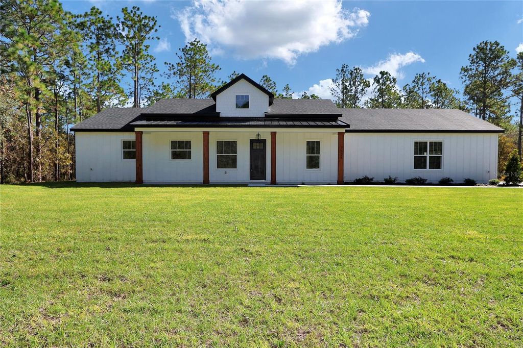 Photo of 7525 SW 136 Terrace, Dunnellon, FL 34432 (MLS # O6349059)